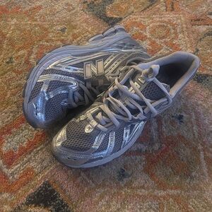 New Balance 1906R sneaker in the "Harbor Grey/Silver Metallic/Concrete"